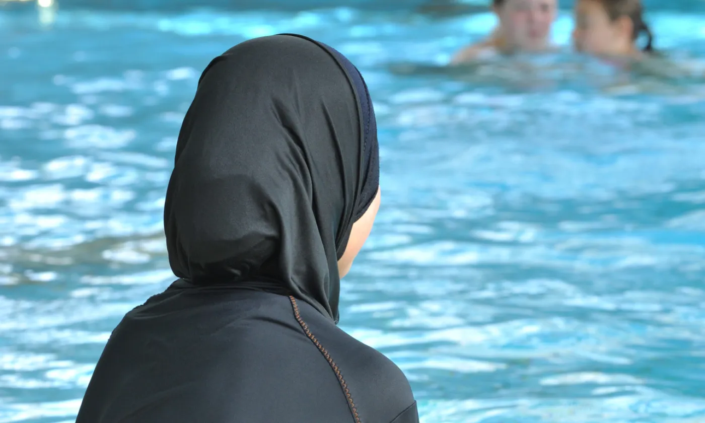 KEYSTONE/DPA/Rolf Haid Les burkinis s'invitent dans les piscines