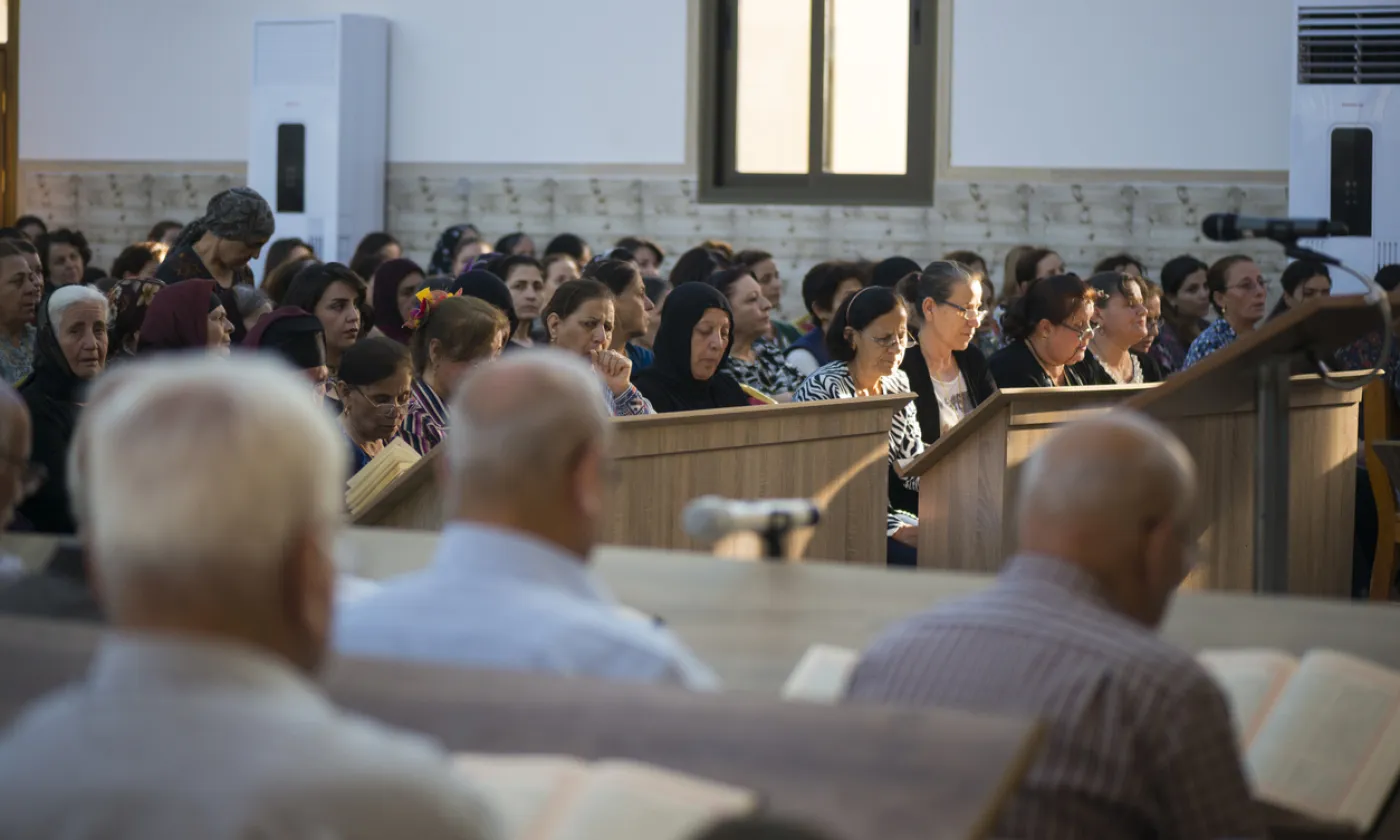 Chrétiens d’Irak à l’Église syriaque catholique à Ankawa, Irak © iStock